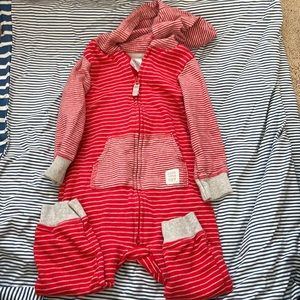Gently worn red and grey one piece with a hood